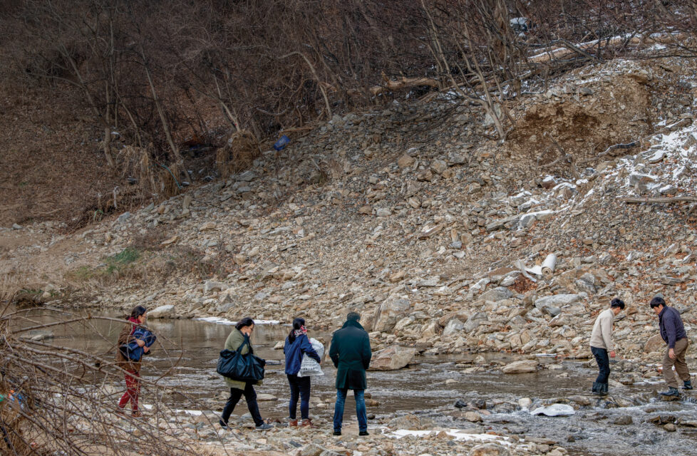 North Koreans Crossing Border